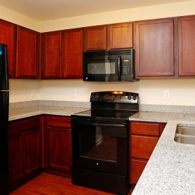 Well-lit kitchen with ample counter space Well-lit kitchen with ample counter space